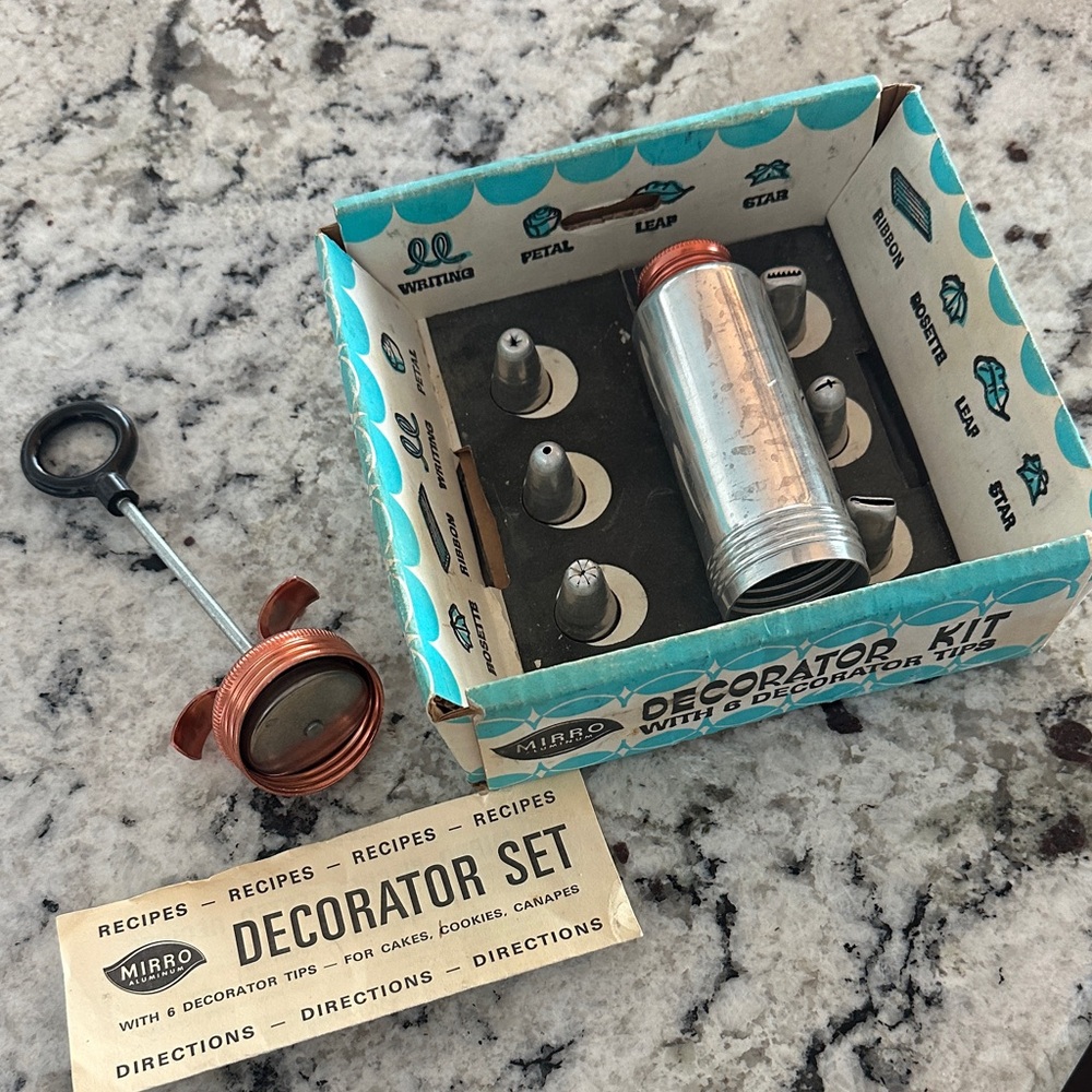 A Mirro Cake Decorator Kit,  model M-0360 from the 1960s.